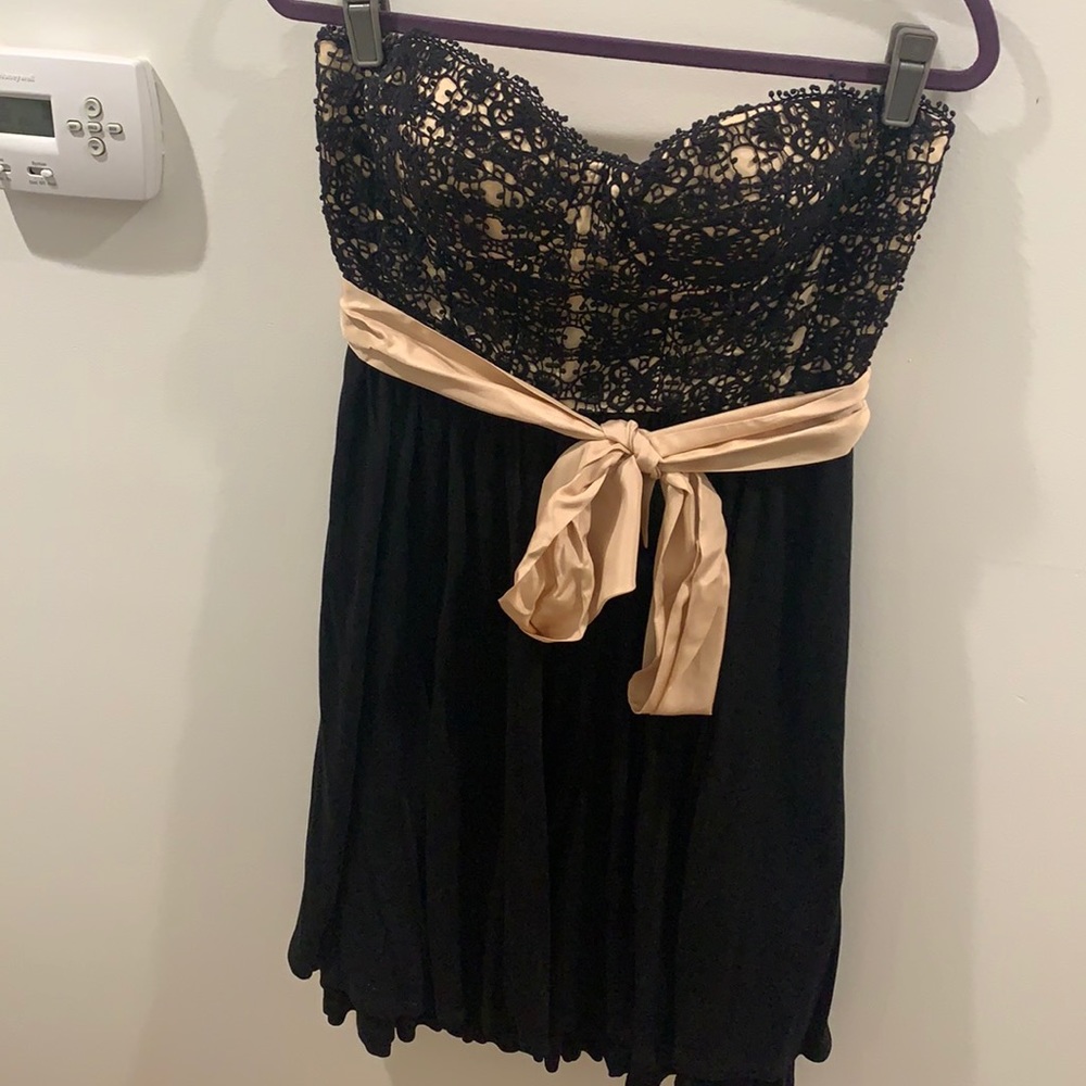 Brought from:Anthropology Worn Once, built in bra, Cotton, Silk Bow